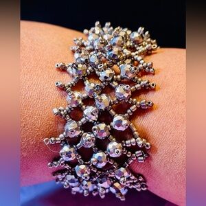 French net beaded silver gray stretchy bracelet. Fits up to 7.5 inch waist.